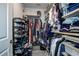 Well-organized closet with shelving and hanging rods at 12821 Bergstrom Bay Dr, Riverview, FL 33579