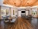 Community room with wood floors and tables at 12821 Bergstrom Bay Dr, Riverview, FL 33579