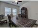 Formal dining room with dark wood table and china cabinet at 12821 Bergstrom Bay Dr, Riverview, FL 33579
