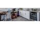 Home office with built-in cabinets and wine cooler at 12821 Bergstrom Bay Dr, Riverview, FL 33579