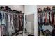 Large walk-in closet with ample hanging and shelf space at 12821 Bergstrom Bay Dr, Riverview, FL 33579