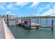 Private dock with boat lift and waterfront access at 20204 Gulf Blvd # 9, Indian Shores, FL 33785