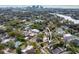 Charming home nestled in a lush, green neighborhood with a view of the downtown skyline at 1002 W Charter St, Tampa, FL 33602