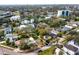 Aerial view of a residential lot with surrounding houses and mature trees in an established neighborhood at 1002 W Charter St, Tampa, FL 33602