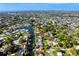 Aerial showing home, canal, and distant city skyline at 5269 Dover Ne St, St Petersburg, FL 33703