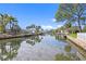 Scenic canal view with lush landscaping and private docks at 5269 Dover Ne St, St Petersburg, FL 33703