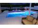 Relaxing pool and spa area at night at 5269 Dover Ne St, St Petersburg, FL 33703