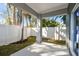 Covered patio, fenced backyard with mature trees at 5334 37Th N St, St Petersburg, FL 33714