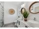 Double vanity, marble shower, and stylish decor at 5334 37Th N St, St Petersburg, FL 33714