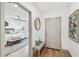 Bright entryway with bench seating, leading to a spacious bedroom at 5334 37Th N St, St Petersburg, FL 33714