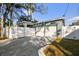 Two-car garage with white doors and concrete driveway at 5334 37Th N St, St Petersburg, FL 33714