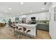 Spacious kitchen with white and gray cabinets, quartz countertops, and island at 5334 37Th N St, St Petersburg, FL 33714