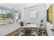 Home office with a white desk, window light, and built-in shelving at 5334 37Th N St, St Petersburg, FL 33714