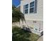 Landscaped area with brick planter and small plants at 13225 101St St # 482, Largo, FL 33773