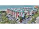 Aerial view of a coastal building complex with parking at 18400 E Gulf Blvd # Ph-11, Indian Shores, FL 33785