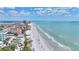 Aerial view of beach with condos and ocean at 18400 E Gulf Blvd # Ph-11, Indian Shores, FL 33785