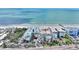 Aerial view of a beachfront condo building and beach at 18400 E Gulf Blvd # Ph-11, Indian Shores, FL 33785