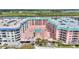 Aerial view of condo complex with pool at 18400 E Gulf Blvd # Ph-11, Indian Shores, FL 33785