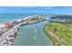 Aerial view of coastline with condo and waterway at 18400 E Gulf Blvd # Ph-11, Indian Shores, FL 33785