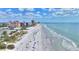 Aerial view of beach with people and ocean at 18400 E Gulf Blvd # Ph-11, Indian Shores, FL 33785