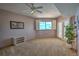 Bright bedroom with ocean view, ceiling fan, and ample space at 18400 E Gulf Blvd # Ph-11, Indian Shores, FL 33785