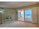 Spacious living room with ocean view, fireplace and balcony access at 18400 E Gulf Blvd # Ph-11, Indian Shores, FL 33785