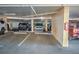 Covered parking garage with assigned parking spaces at 18400 E Gulf Blvd # Ph-11, Indian Shores, FL 33785