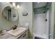 Stylish bathroom with a walk-in shower and updated fixtures at 103 Cypress Pond Rd # 103, Palm Harbor, FL 34683