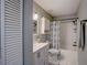 Second bathroom with tub shower combination at 103 Cypress Pond Rd # 103, Palm Harbor, FL 34683