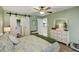 Serene bedroom with sliding barn door and ceiling fan at 103 Cypress Pond Rd # 103, Palm Harbor, FL 34683