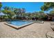 Community pool with plenty of lounge chairs at 103 Cypress Pond Rd # 103, Palm Harbor, FL 34683