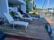 Private deck overlooking the water with lounge chairs and dock access at 821 Bahia Del Sol Dr # 43, Ruskin, FL 33570