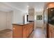 Kitchen island with granite countertop and light wood cabinets at 821 Bahia Del Sol Dr # 43, Ruskin, FL 33570