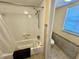 Walk-in shower with grab bars and a toilet in a separate room at 8304 Bardmoor Blvd # 104, Seminole, FL 33777