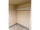 Small closet with a single rod for hanging clothes at 8304 Bardmoor Blvd # 104, Seminole, FL 33777