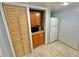 Kitchenette with microwave, cabinets, and refrigerator at 8304 Bardmoor Blvd # 104, Seminole, FL 33777