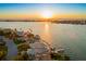 Luxury waterfront property at sunset at 266 8Th N Ave, Tierra Verde, FL 33715