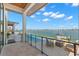 Balcony overlooking the pool and the stunning waterfront views at 266 8Th N Ave, Tierra Verde, FL 33715