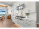 Modern kitchen with stainless steel appliances and white shaker cabinets at 266 8Th N Ave, Tierra Verde, FL 33715