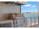 Stainless steel outdoor kitchen with water views at 266 8Th N Ave, Tierra Verde, FL 33715