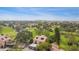 Aerial view of condo community near golf course and waterfront at 6302 Pelican Creek Xing # A, St Petersburg, FL 33707