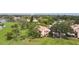 Aerial view of condo near golf course and waterfront at 6302 Pelican Creek Xing # A, St Petersburg, FL 33707