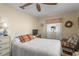 Charming bedroom with a double bed and wicker chair at 247 93Rd N Ave, St Petersburg, FL 33702