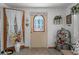 Inviting entryway with decorative door and charming accents at 247 93Rd N Ave, St Petersburg, FL 33702