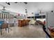 Bright Florida room featuring a bar and comfortable seating at 247 93Rd N Ave, St Petersburg, FL 33702