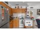 Efficient kitchen with wood cabinets and appliances at 247 93Rd N Ave, St Petersburg, FL 33702