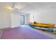 Recreation room with purple mat flooring and kayaks for storage at 1375 Pinellas Bayway S # 29, Tierra Verde, FL 33715