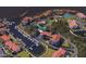 Aerial view of waterfront property with a marina, mature landscaping, and community pool at 1806 Mariner Dr # 214, Tarpon Springs, FL 34689