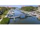 Enjoy a scenic aerial view of the community marina and waterway at 1806 Mariner Dr # 214, Tarpon Springs, FL 34689