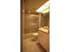Bathroom featuring a shower/tub, a toilet, and a vanity at 1806 Mariner Dr # 214, Tarpon Springs, FL 34689